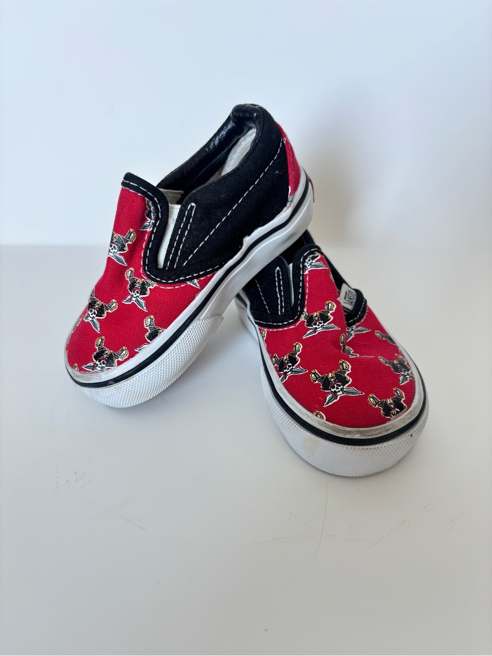 Vans Kids Slip-On Sneakers in Red and Black with Skate Print
